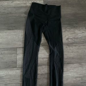 Lululemon size 4 leggings with details on legs